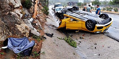 Torba’da feci kaza, ticari taksi taklalar atarak kayalara çarpıp durdu