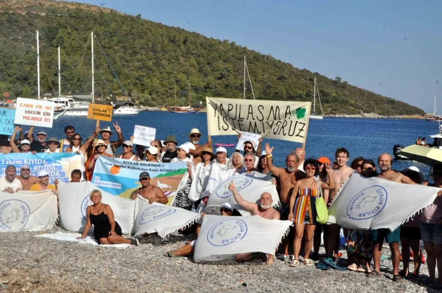 Mavi yolculuğun başladığı Kissebükü’nde kıyı eylemi yaptılar turizm bakanına çağrıda bulundular “Doğaya beton dikerek turizm yapılamaz”