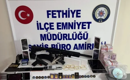 Dolandırıcılık şüphelisinin evinden cephanelik çıktı