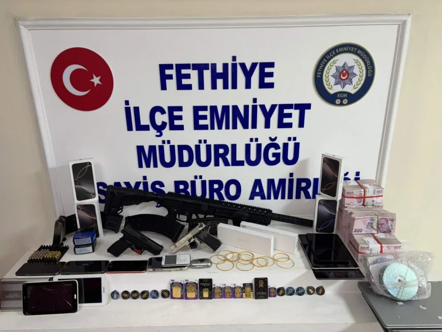 Dolandırıcılık şüphelisinin evinden cephanelik çıktı
